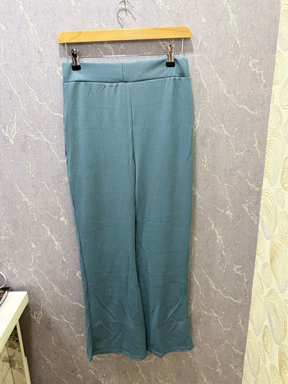 Turquoise blue ribbed flare pants – product view