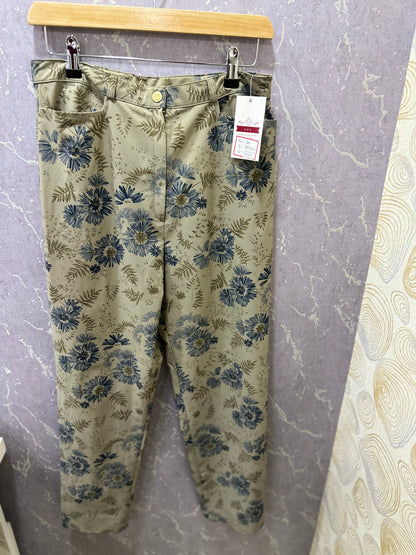 Mehendi green floral print pants in cotton blend