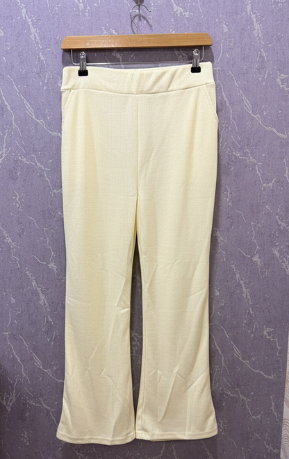 Ivory ribbed flare pants – product view