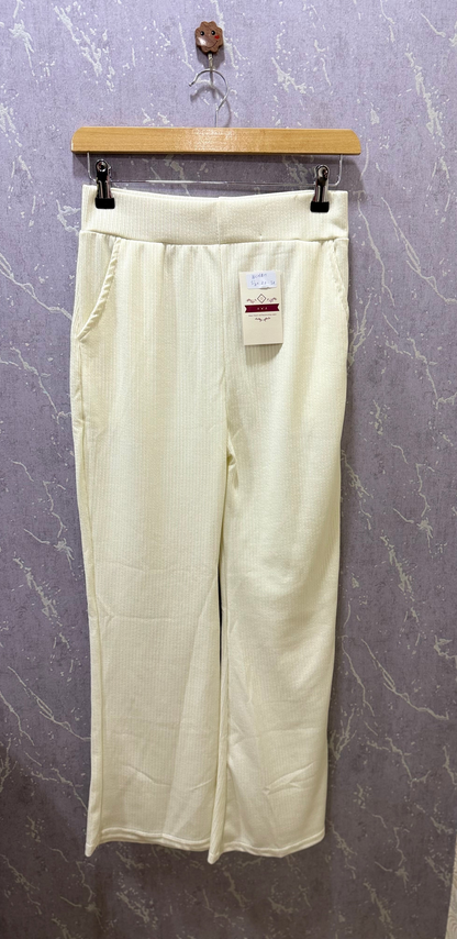 Off-white ribbed flare pants – product view