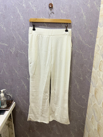 White ribbed flare pants – product view