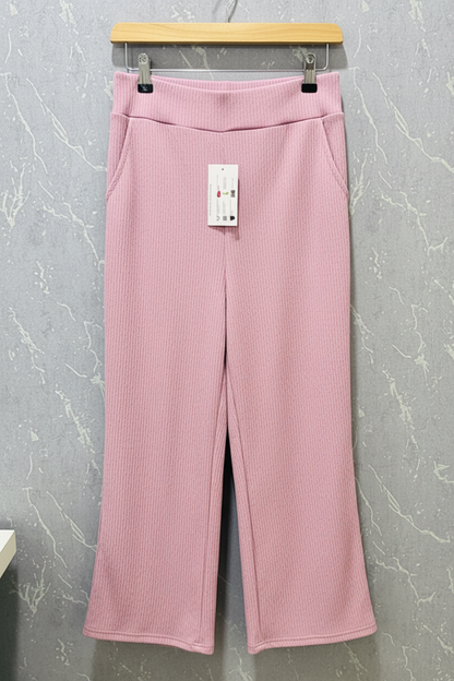 Nude pink ribbed flare pants – product view
