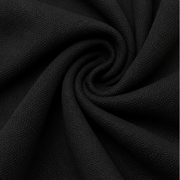 Close-up of the black Italian Crepe fabric with a fine textured finish