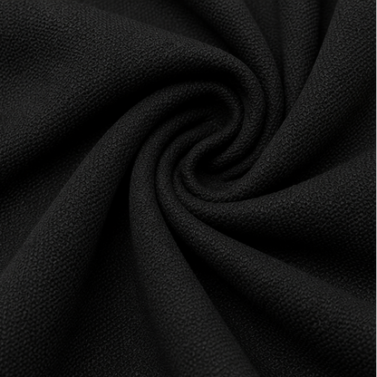 Close-up of the black Italian Crepe fabric with a fine textured finish