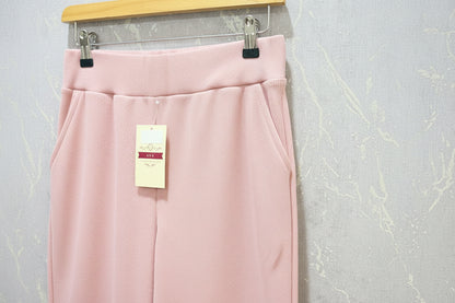 Nude pink ribbed flare pants – product view