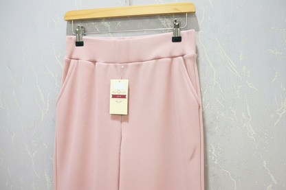 Nude pink ribbed flare pants – product view