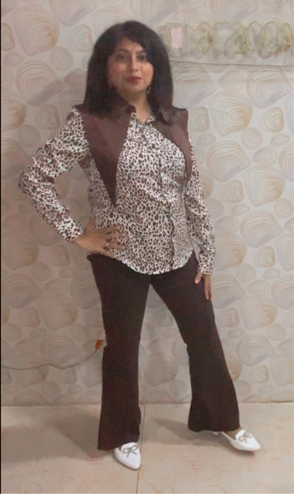 Model wearing anti-wrinkle brown bell bottoms by A 'n' A