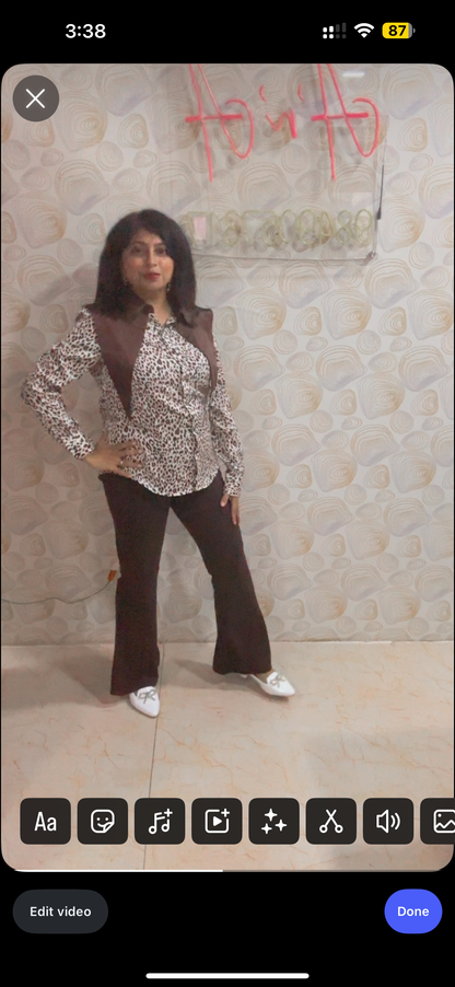 Model wearing anti-wrinkle brown bell bottoms by A 'n' A