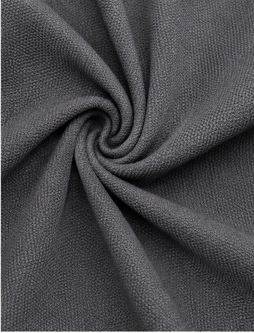 Close-up of the grey Italian Crepe fabric with a fine textured finish