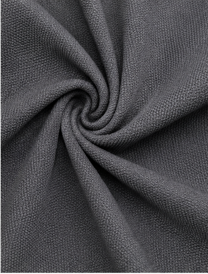 Close-up of the grey Italian Crepe fabric with a fine textured finish