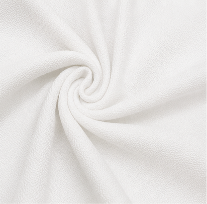 Close-up of the Italian Crepe fabric with a fine textured finish